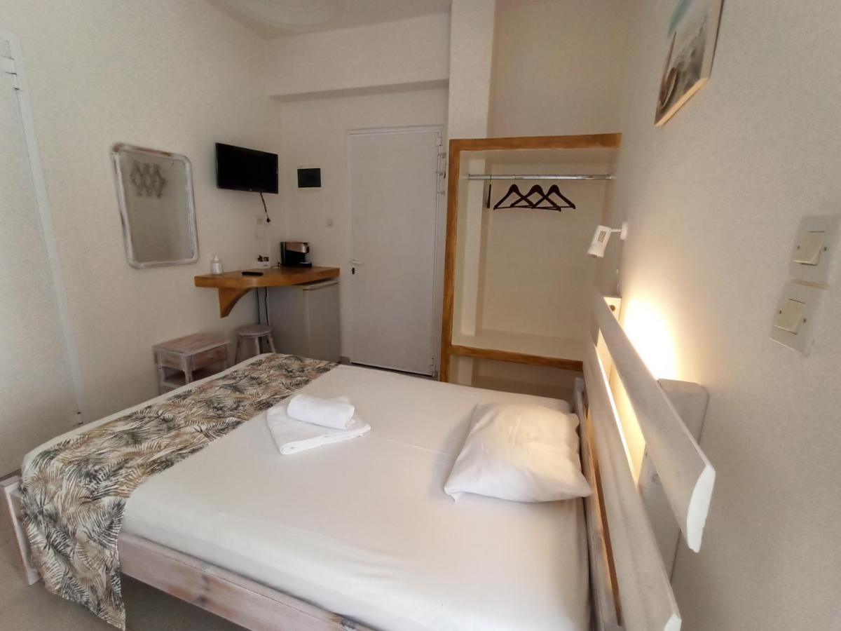Peaceful Bay Hotel Megas Gialos - Nites Bagian luar foto